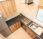 View of Plymouth University's modern kitchen in 1 bed flat in Stoke.