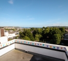 Open rooftop terrace in plymouth university student flat.
