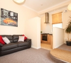 Open plan lounge and kitchen in University of Plymouth student flat.
