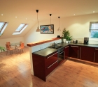 Open plan kitchen dining room in plymouth university modern shared flat.